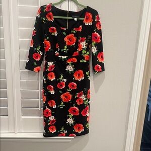 B. Smart Black Dress with Red Floral Design